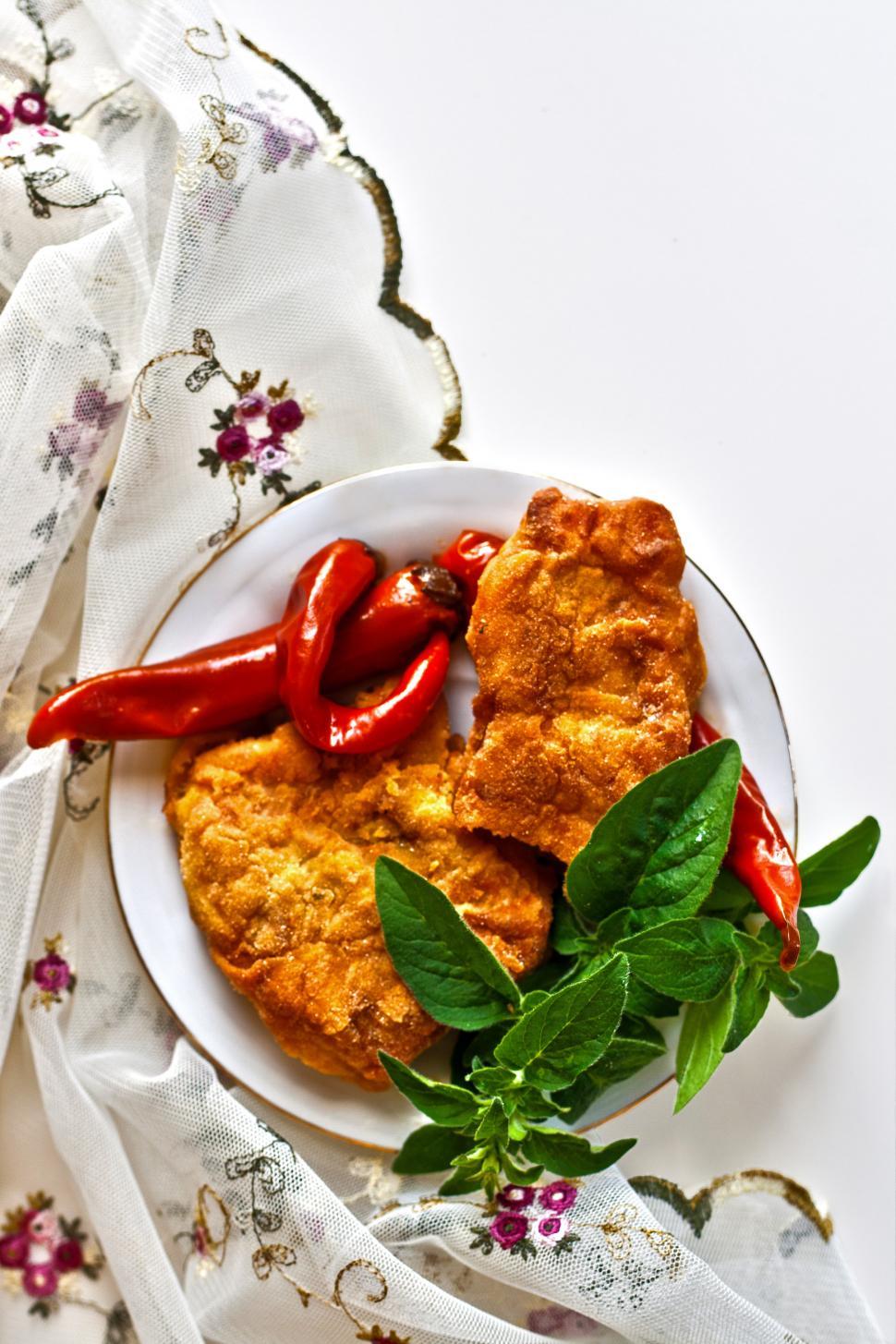 Free Image of White Plate With Fried Food and Cloth 