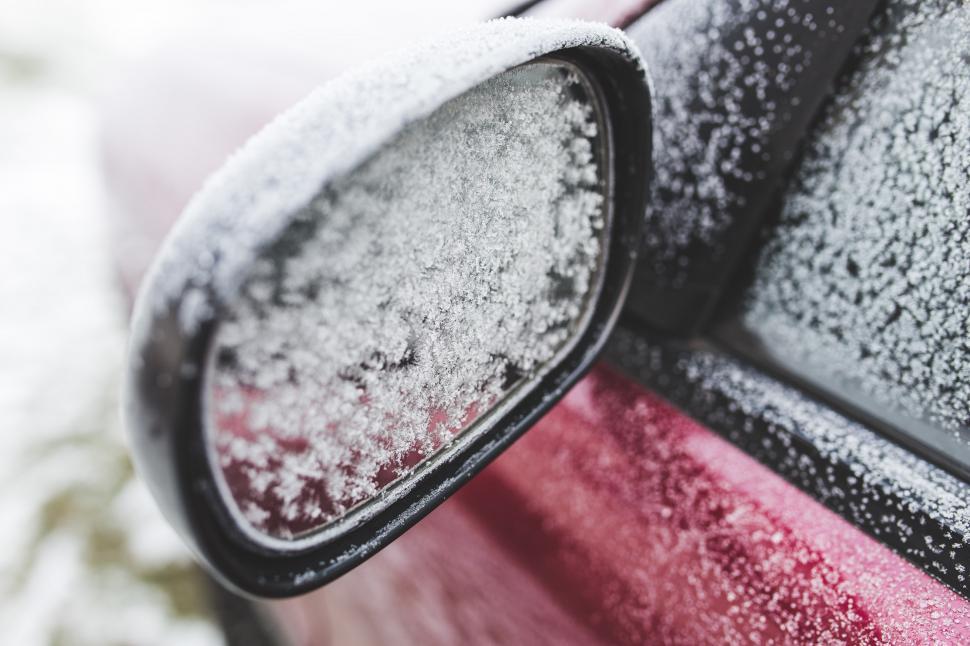 Free Image of Snow-Covered Side Mirror of a Car 