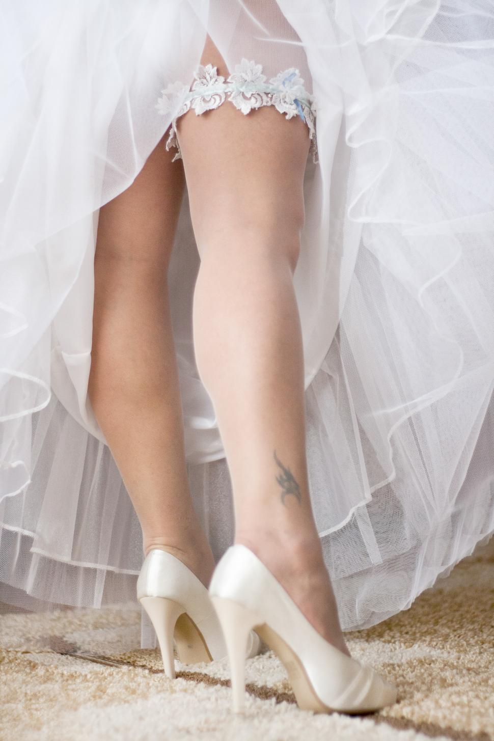 Free Image of Woman in White Dress and High Heels 