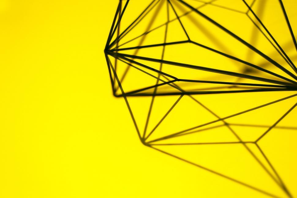 Free Image of Shadow of Wire Structure on Yellow Background 