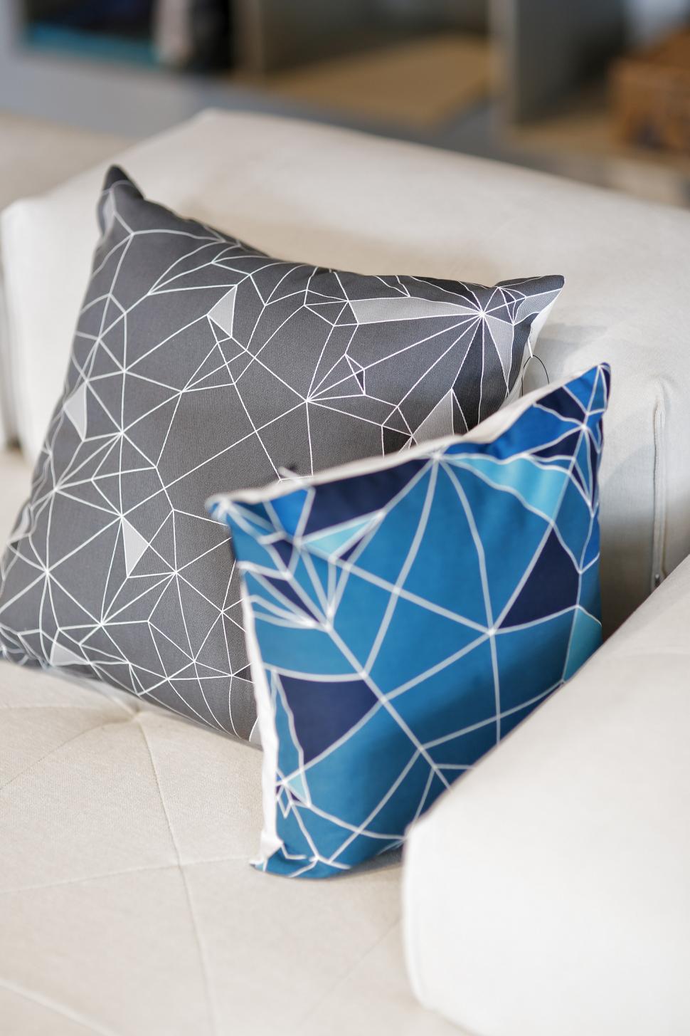Free Image of Close Up of Two Pillows on a Couch 