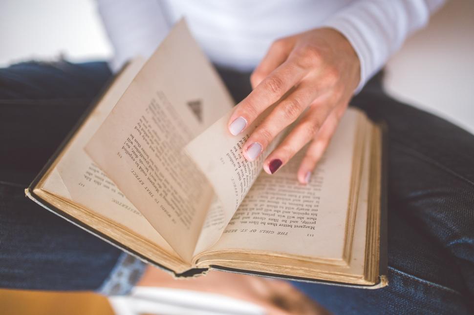 Free Image of Woman Holding a Book 