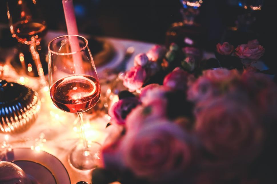 Free Image of Alcohol Night Party Pink Wine evening lights rose single wine alcohol candle glass celebration sweet food fruit drink beverage 