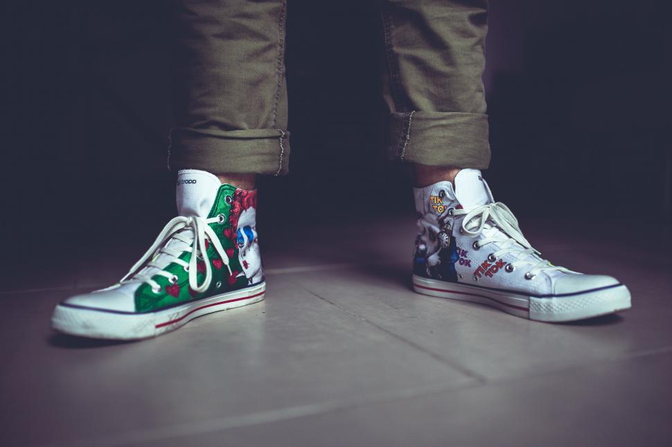 Free Image of White Sneakers With Green and Red Design 