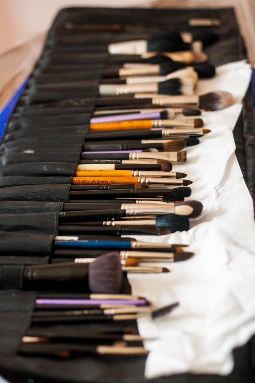 Free Image of Array of Paint Brushes on Table 