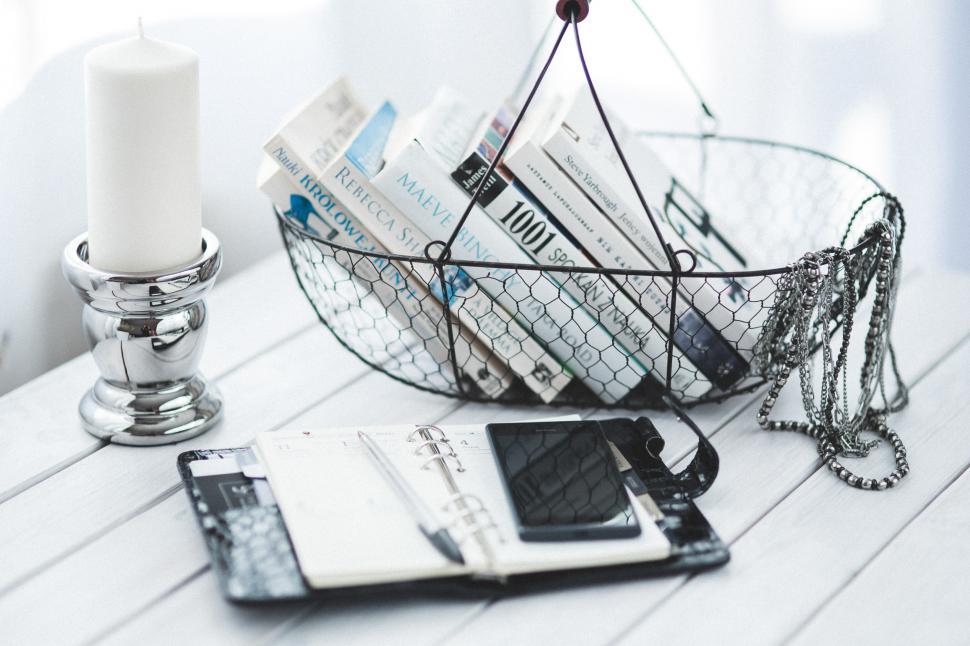 Free Image of Basket Book Decor Decoration Home Interior Pen books business candle cans cellphone desk female minimalist mobile notebook organizer phone planing silver smartphone white working 