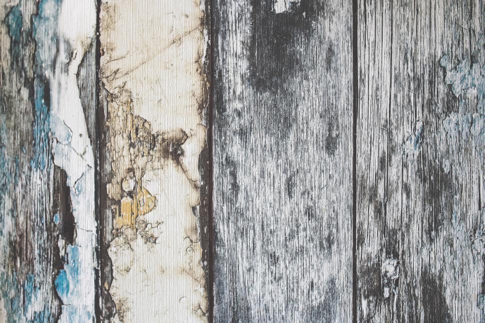 Free Image of Close Up of a Wooden Wall With Peeling Paint 