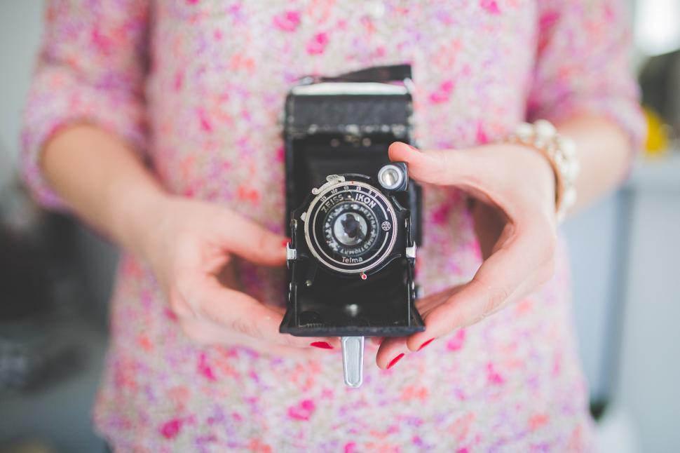 Free Image of Camera Girl Old hands photographer photography photos takingphotos vintage woman telephone equipment dial combination lock lock device dial telephone metal technology business lens 