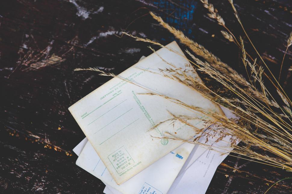 Free Image of Stack of Papers on Wooden Table 