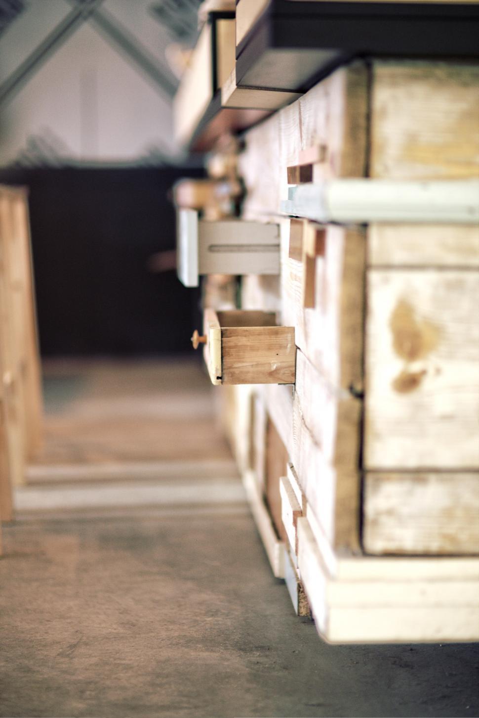 Free Image of Stack of Wooden Boxes in Warehouse 