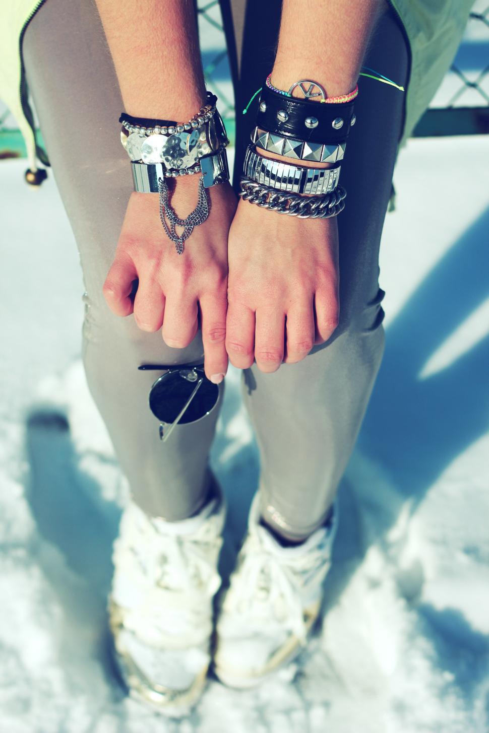 Free Image of Person Wearing Skis and Bracelets 