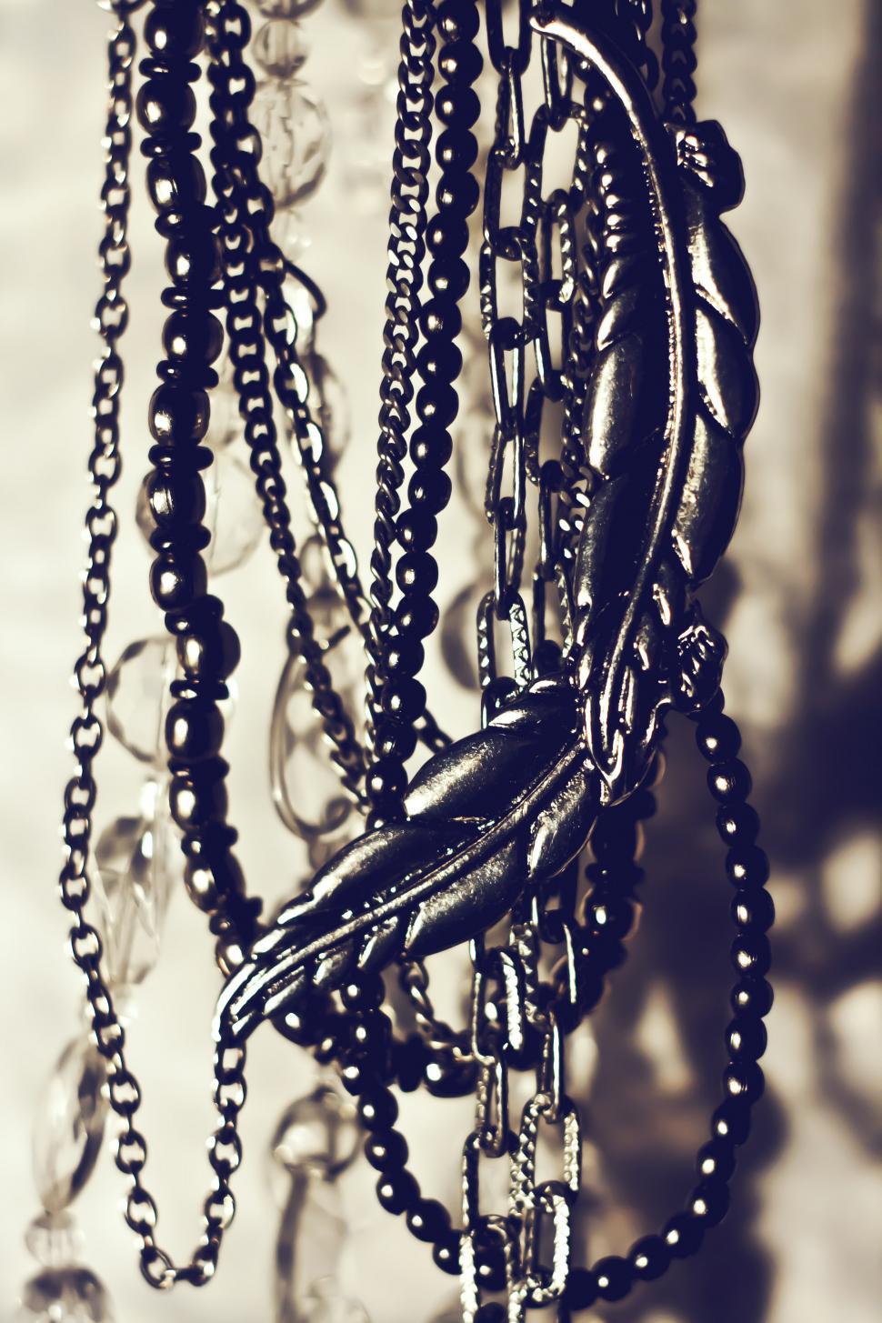 Free Image of Beads Hanging From Chandelier 