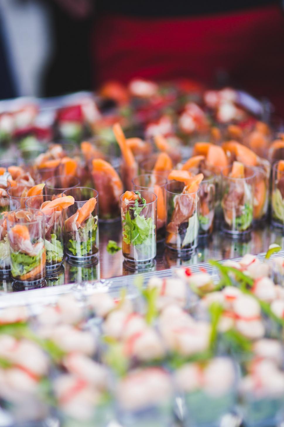 Free Image of Table Filled With Glasses of Food 