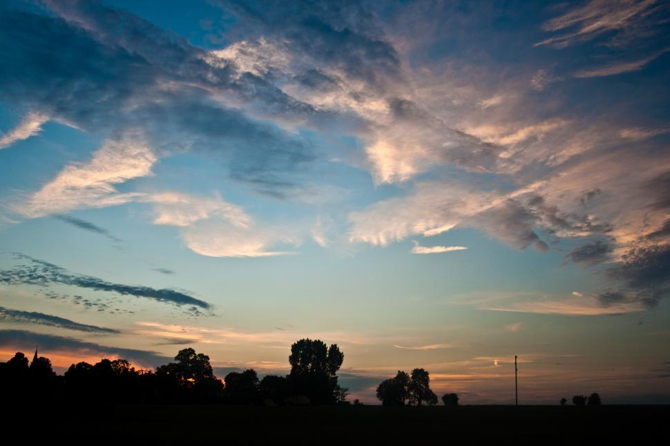 Free Image of Sunset Sky Filled With Abundant Clouds 