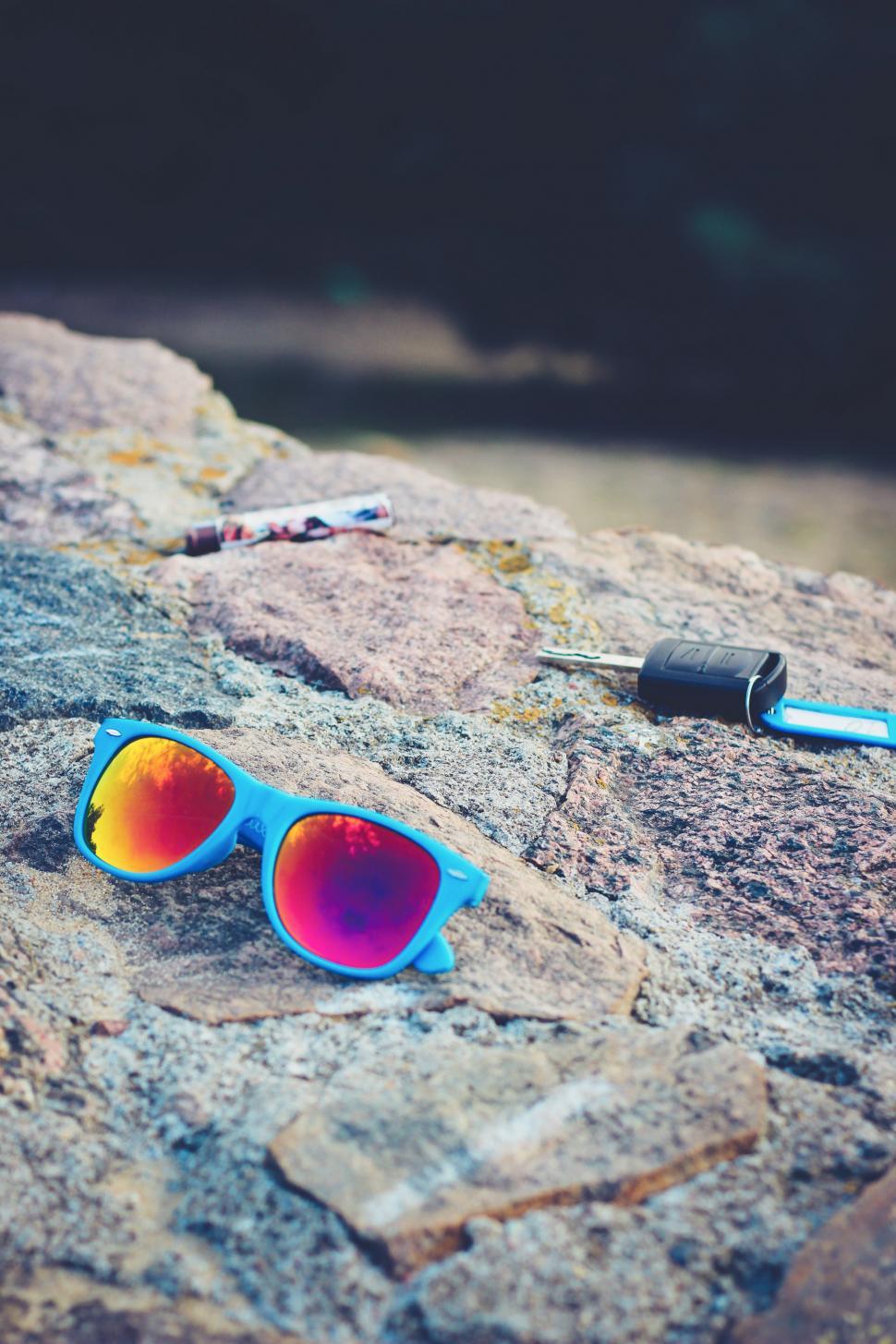 Free Image of Sunglasses on Rock 