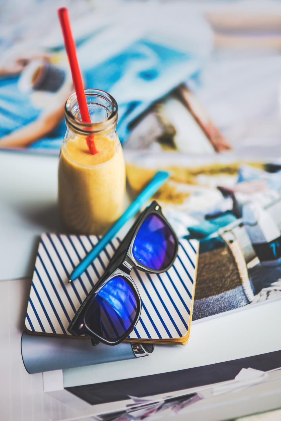 Free Image of Sunglasses Resting on Table 