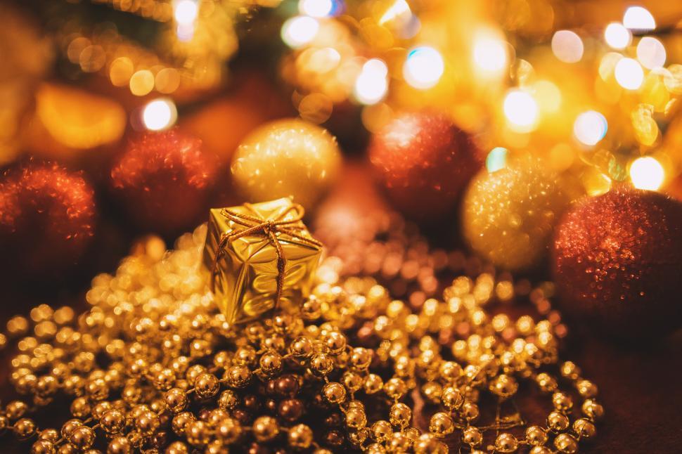 Free Image of Golden Ornament Among Christmas Ornaments 