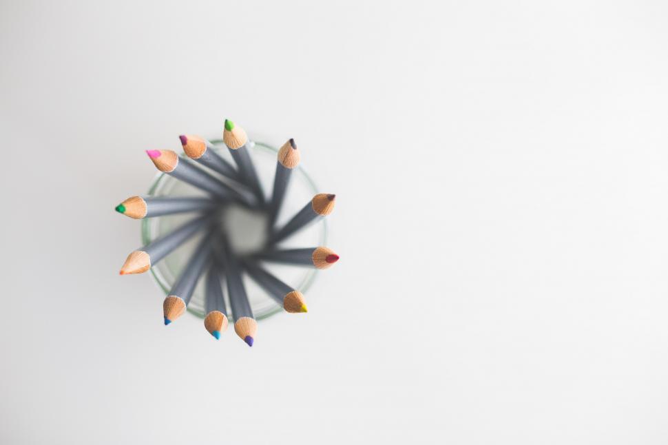 Free Image of Group of Pencils on White Surface 