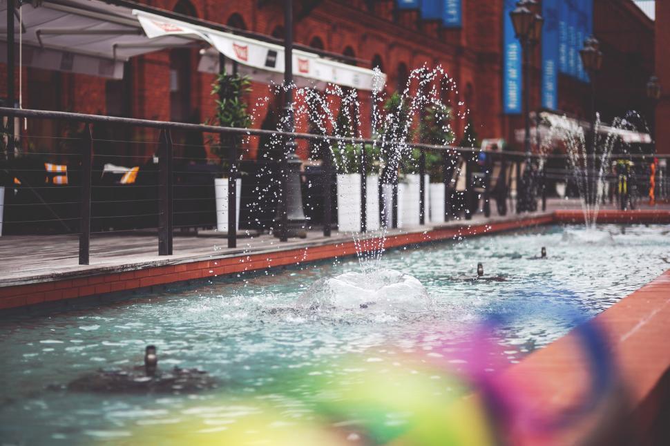Free Image of Fountain city drops lodz manufaktura splashing spraying streen streetphoto town water waterdrops watering waterstream architecture building city travel water urban sky tourism sea boat cityscape landscape river house ship waterfront landmark 