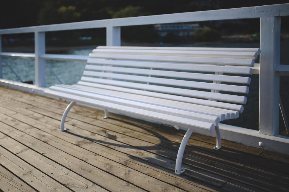 Free Image of White Bench on Wooden Deck 