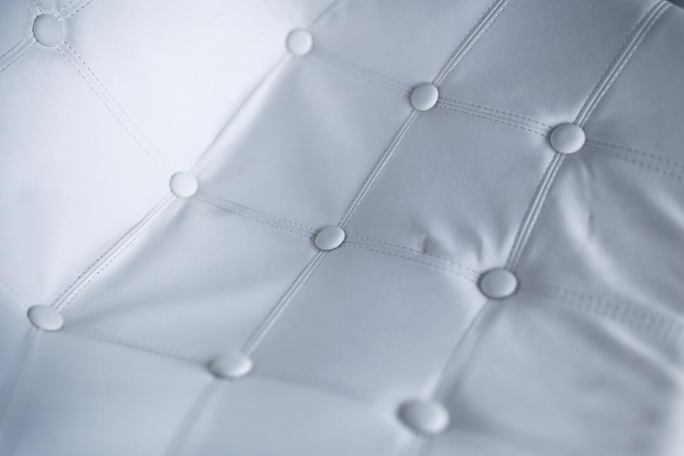 Free Image of Close Up of a Bed With Buttons 