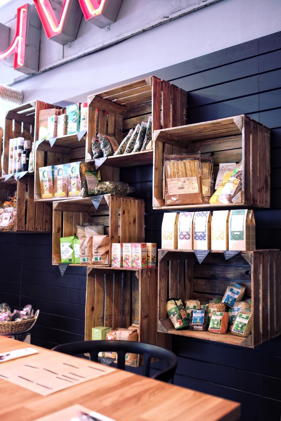 Free Image of Wooden Crates Adorning Restaurant Wall 