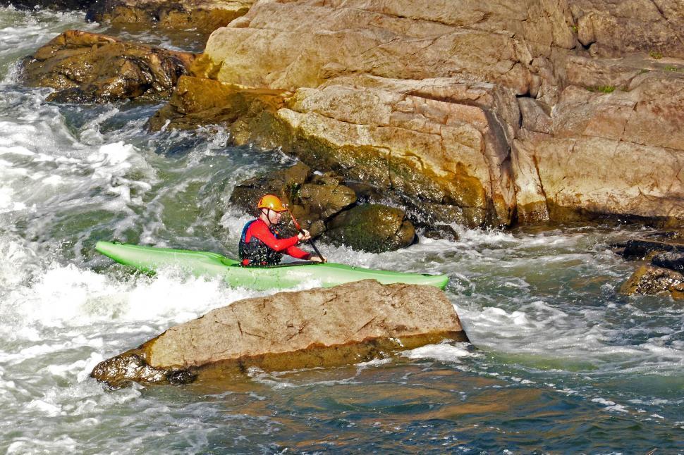 Free Image of Kayaker Battling Rocks 