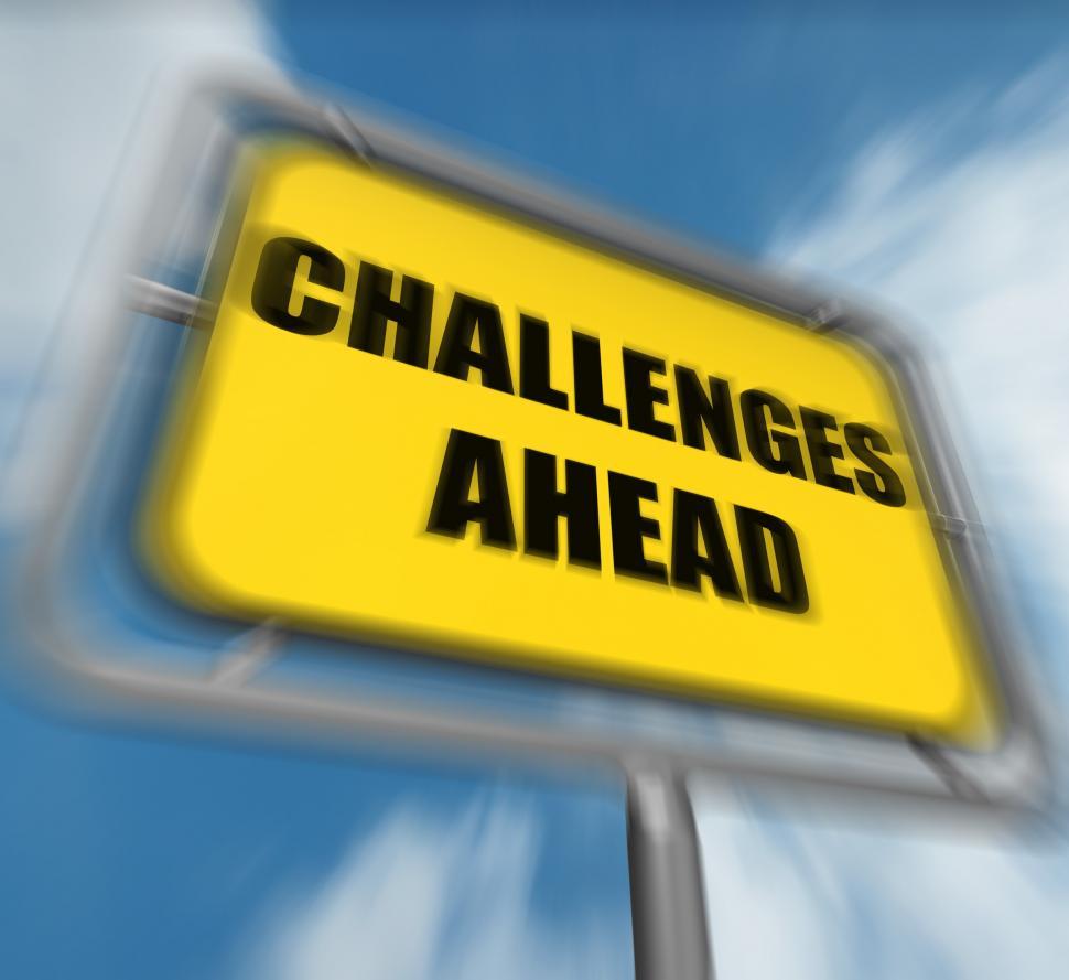 Free Image of Challenges Ahead Sign Displays to Overcome a Challenge or Diffic 
