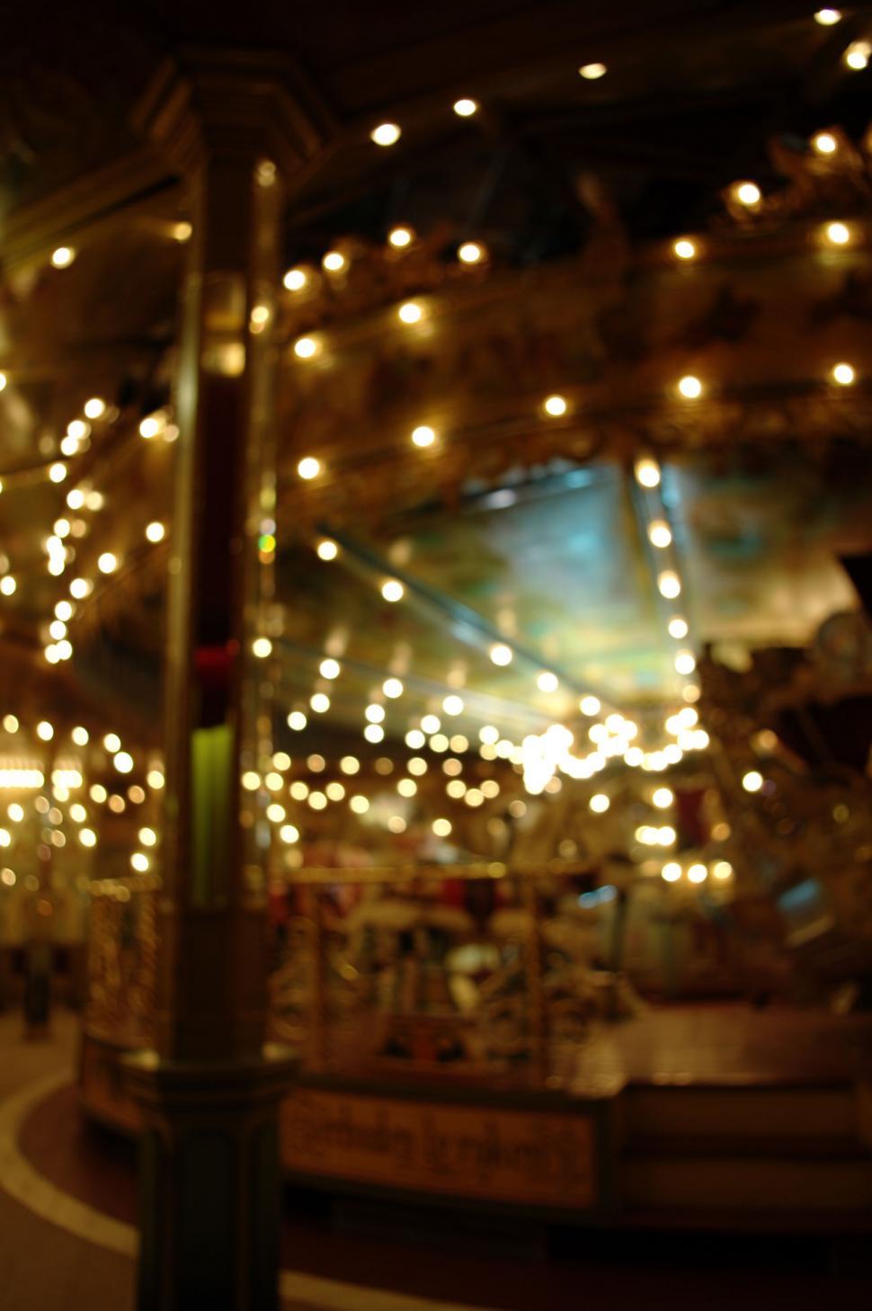Free Image of Vibrant Carousel Illuminated by Bright Lights 