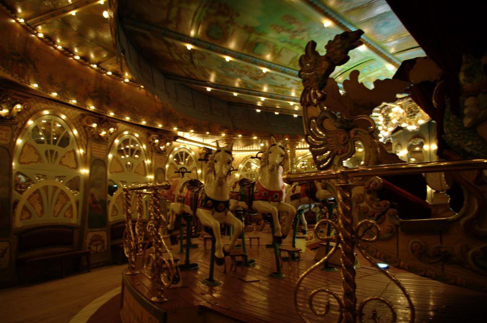 Free Image of Carousel With Many People Riding 