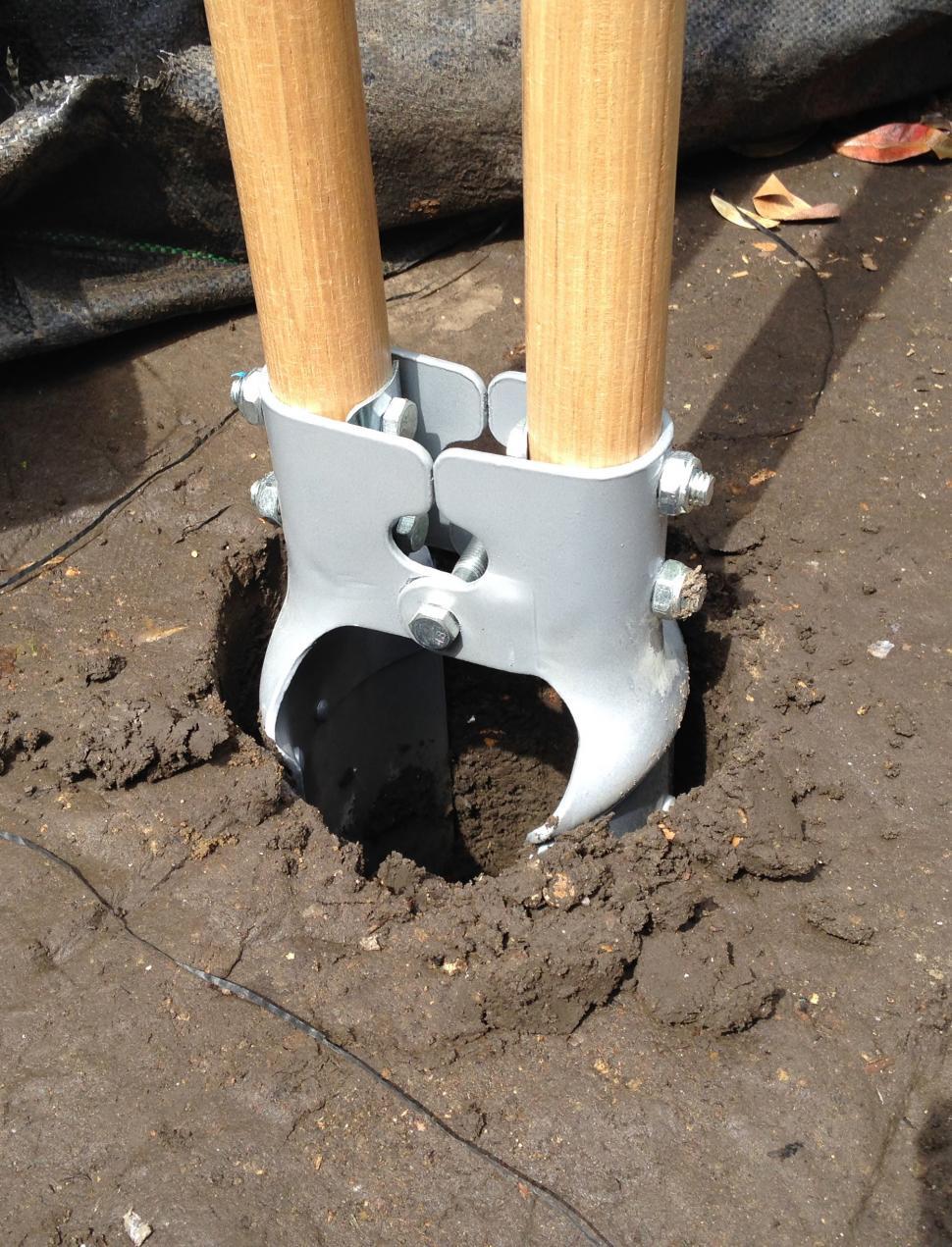 Free Image of Post hole digger in hole 