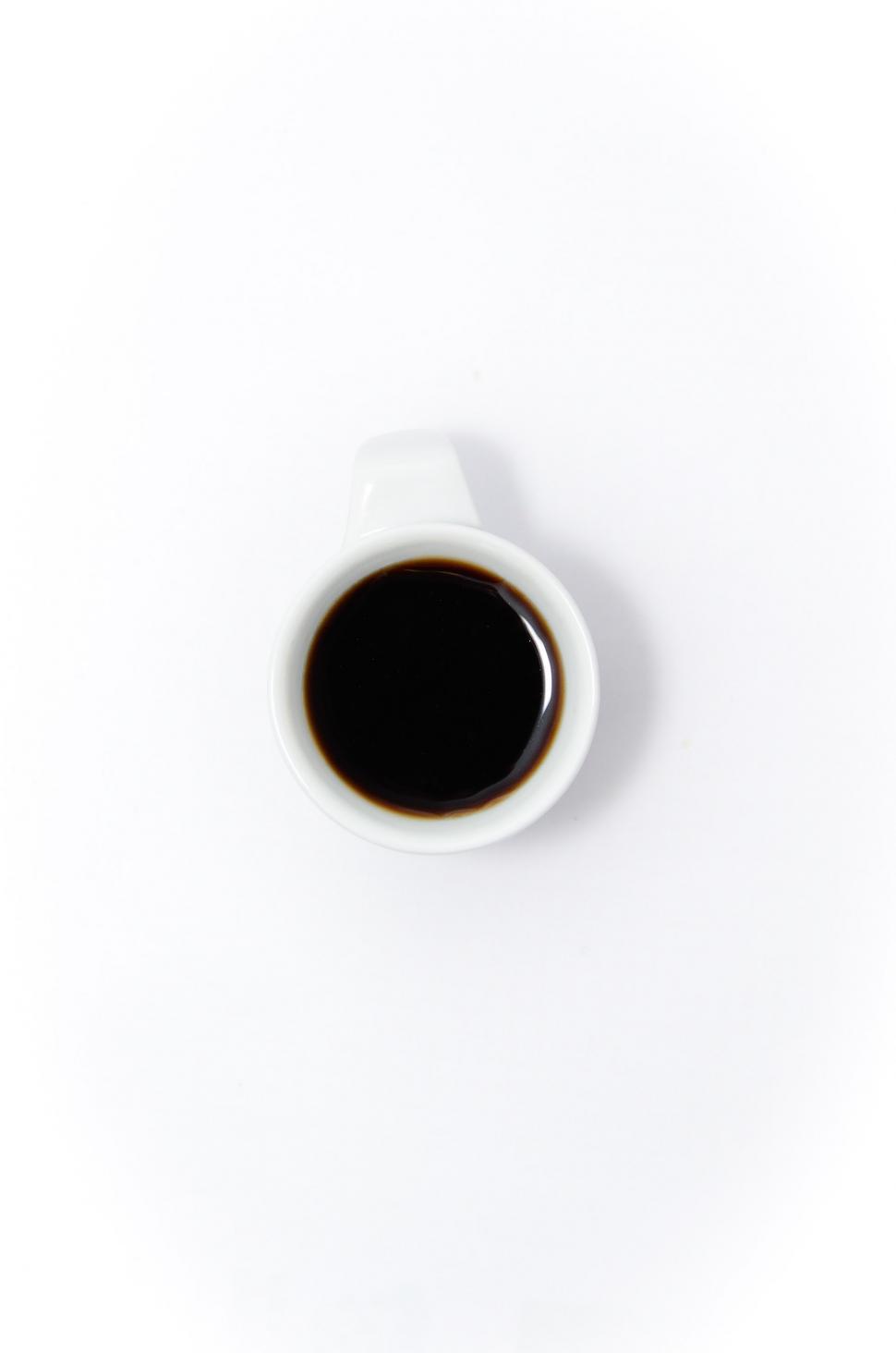 Free Image of A Cup of Coffee on a White Table 