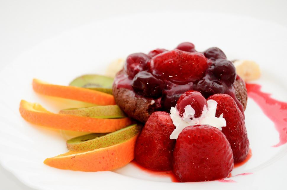 Free Image of White Plate With Fruit and Sauce 