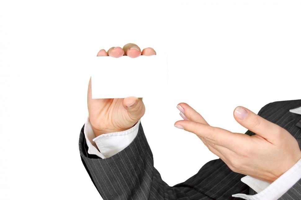 Free Image of Man in Suit Holding Business Card 