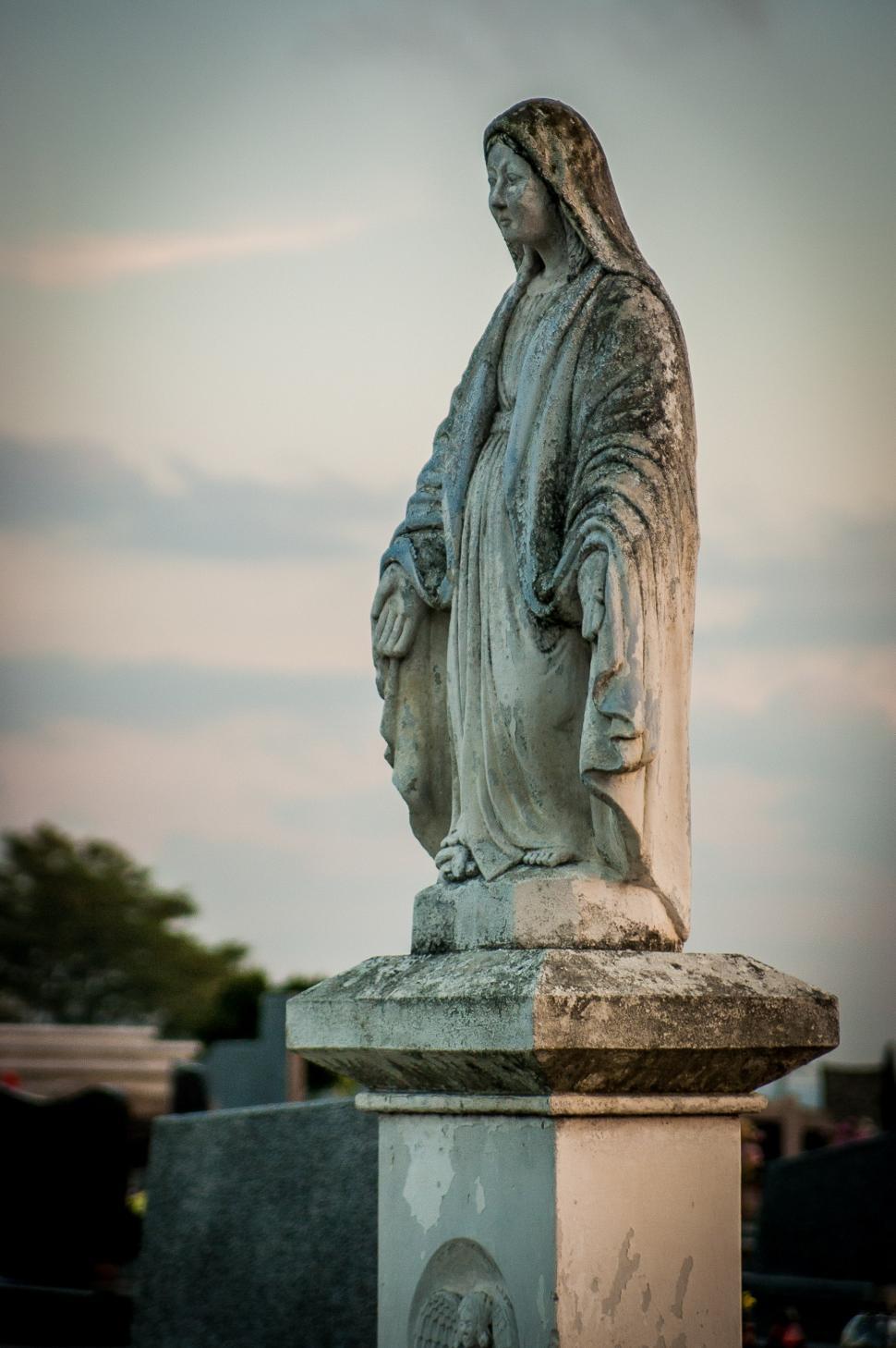 Free Image of Statue of a Woman in a Cemetery 