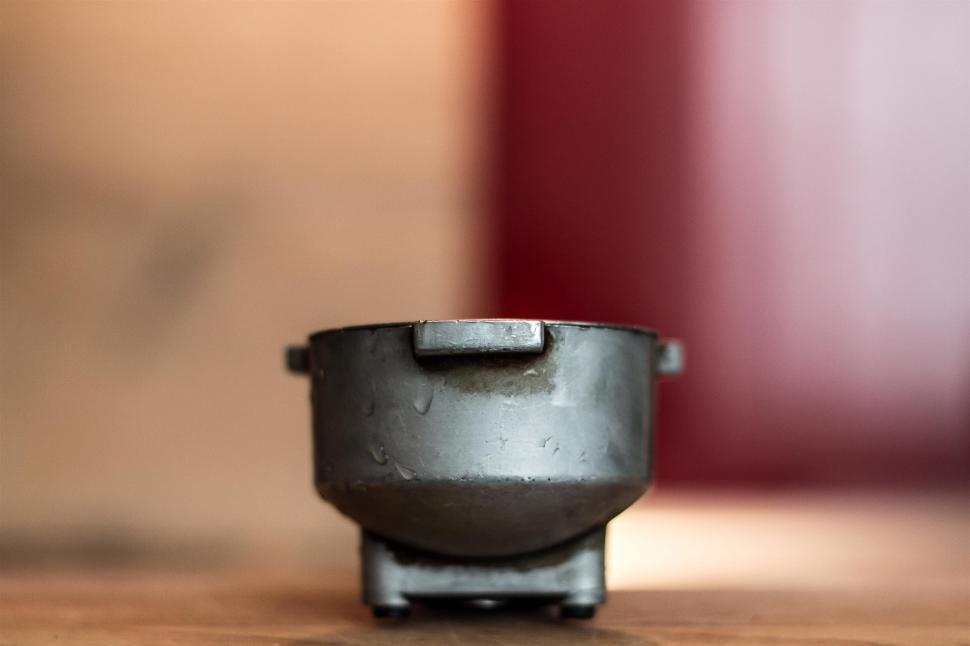Free Image of Black Pot on Wooden Table 