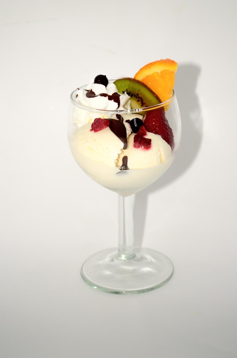 Free Image of Glass Filled With Ice Cream and Fruit 