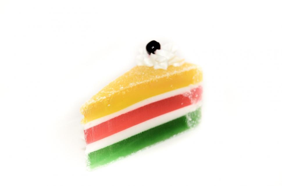 Free Image of A Piece of Cake With a Flag on Top 
