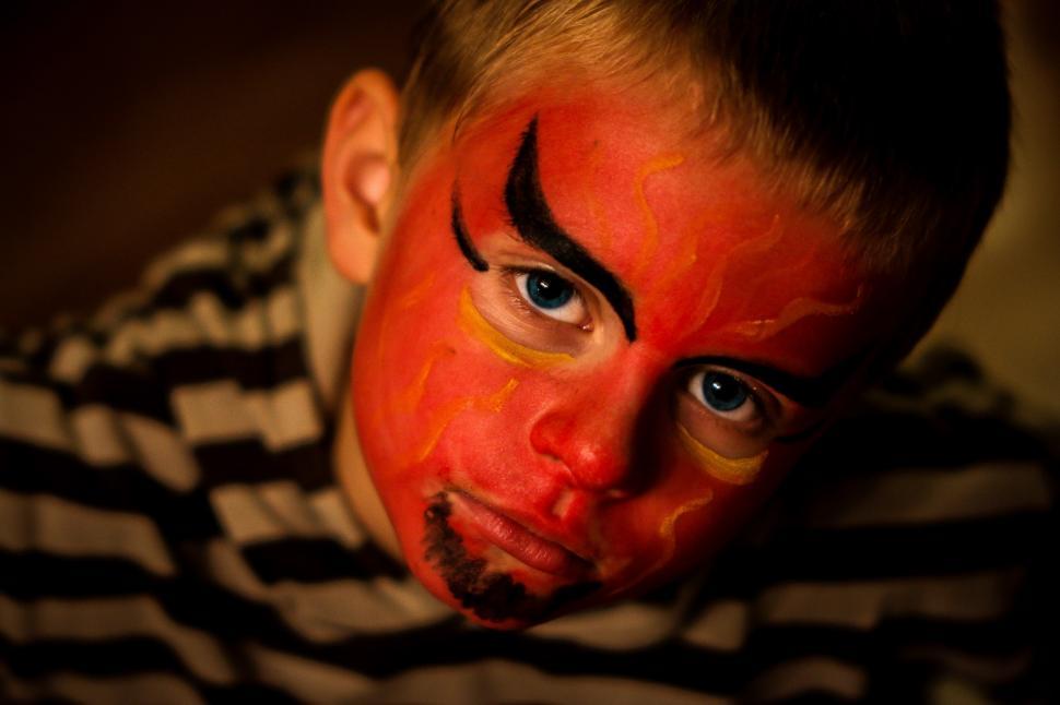 Free Image of Man With Red Clown Face Paint 