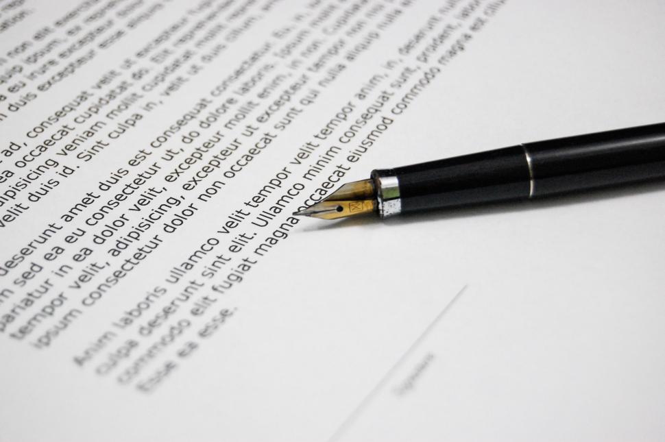 Free Image of Pen on Top of Paper 