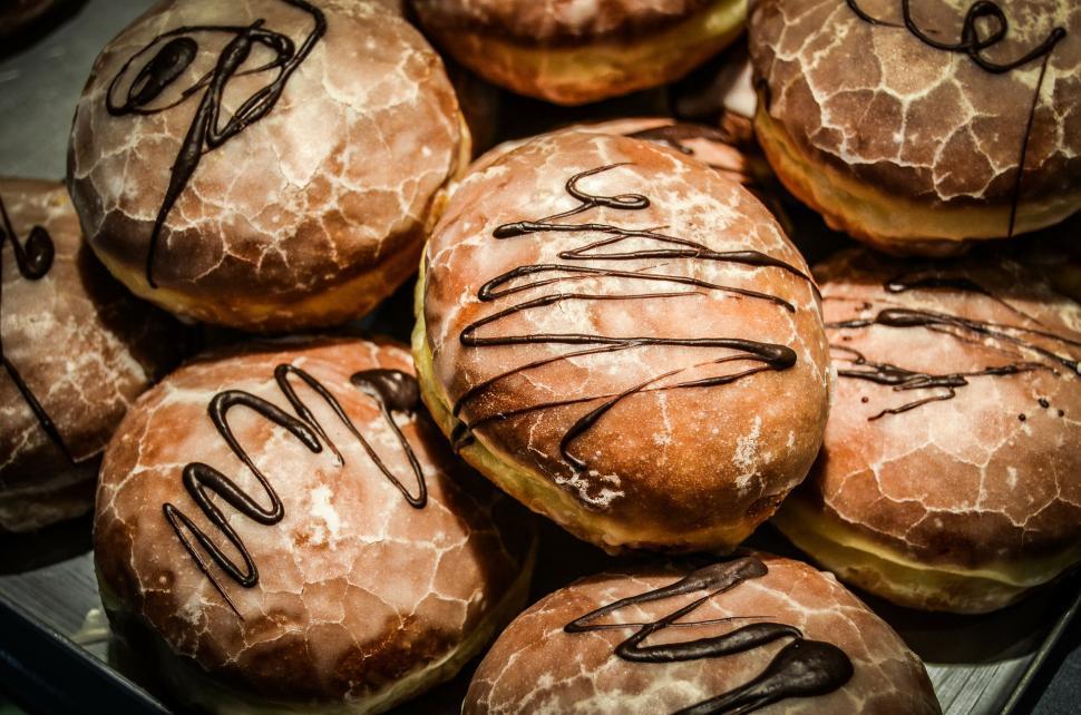 Free Image of Close Up of Doughnuts With Writing 