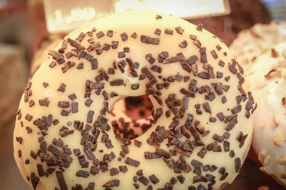 Free Image of Close Up of a Doughnut With Chocolate Sprinkles 