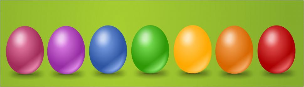 Free Image of Row of Colorful Easter Eggs on Green Background 