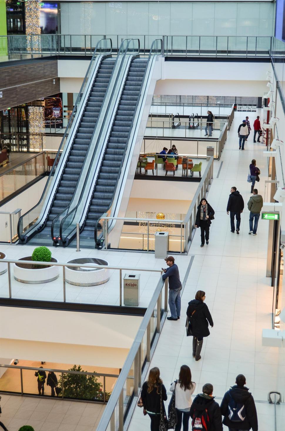 Free Image of People Walking Around a Mall 