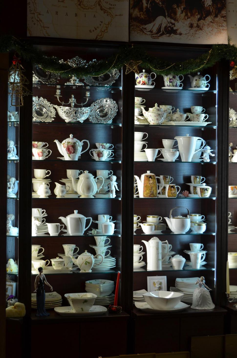 Free Image of Display Case Filled With White Dishes 