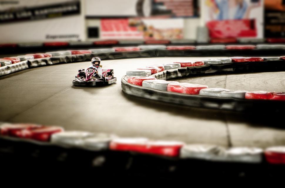 Free Image of Small Toy Car Racing Around a Track 