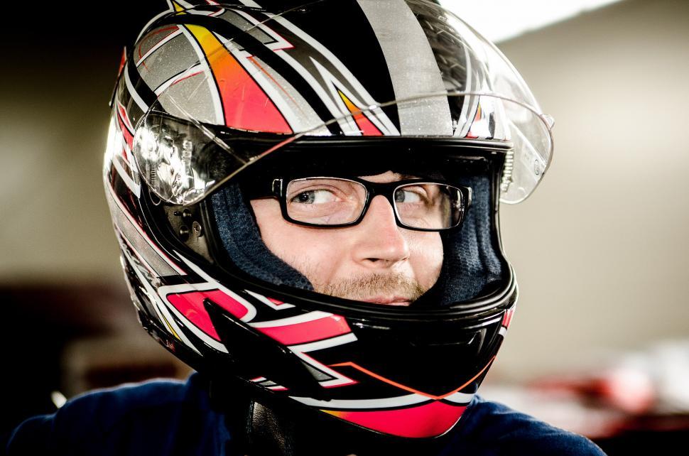 Free Image of Man Wearing Motorcycle Helmet and Glasses 