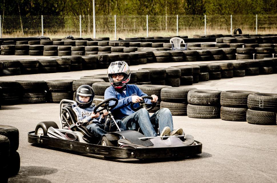 Free Image of Couple Riding Kart Together 