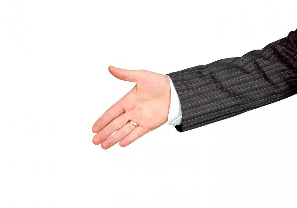 Free Image of Confident Businessman Extending Hand Gesture 