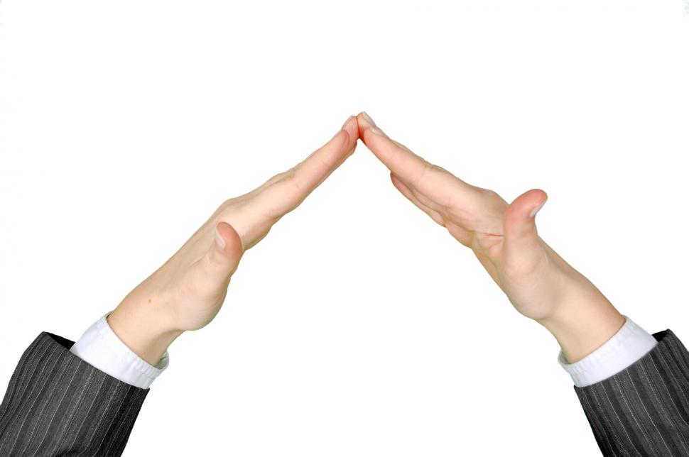 Free Image of Two Hands Forming Triangle With Fingers 